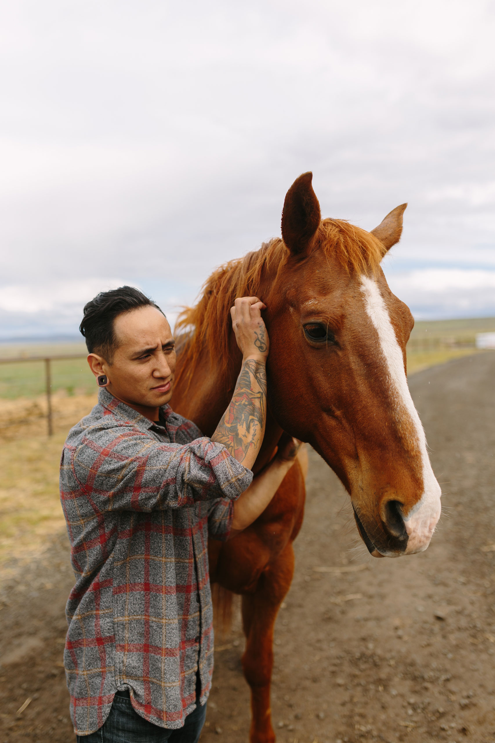 Man tattooed arm with horse