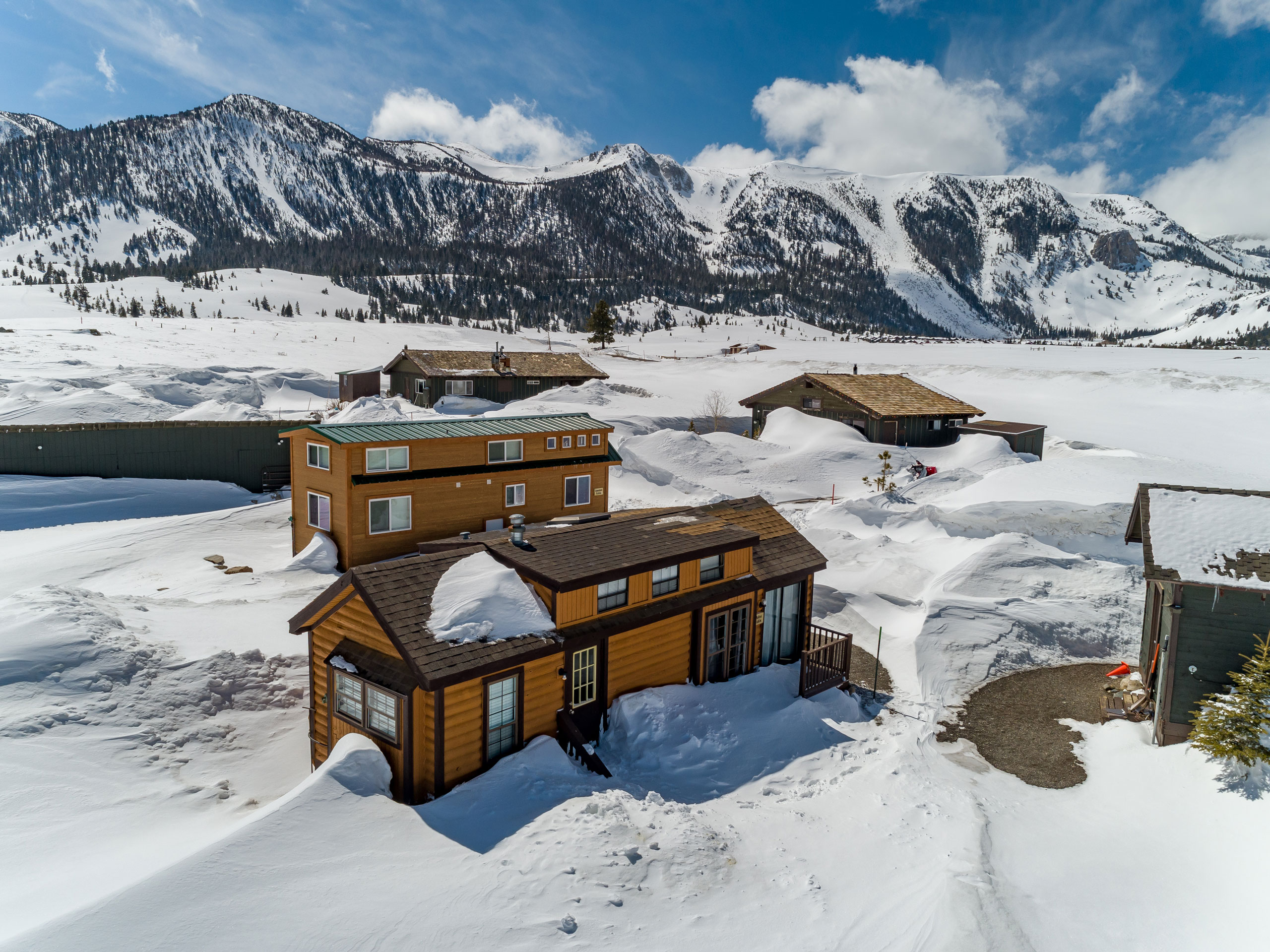 Cabins covered in snow