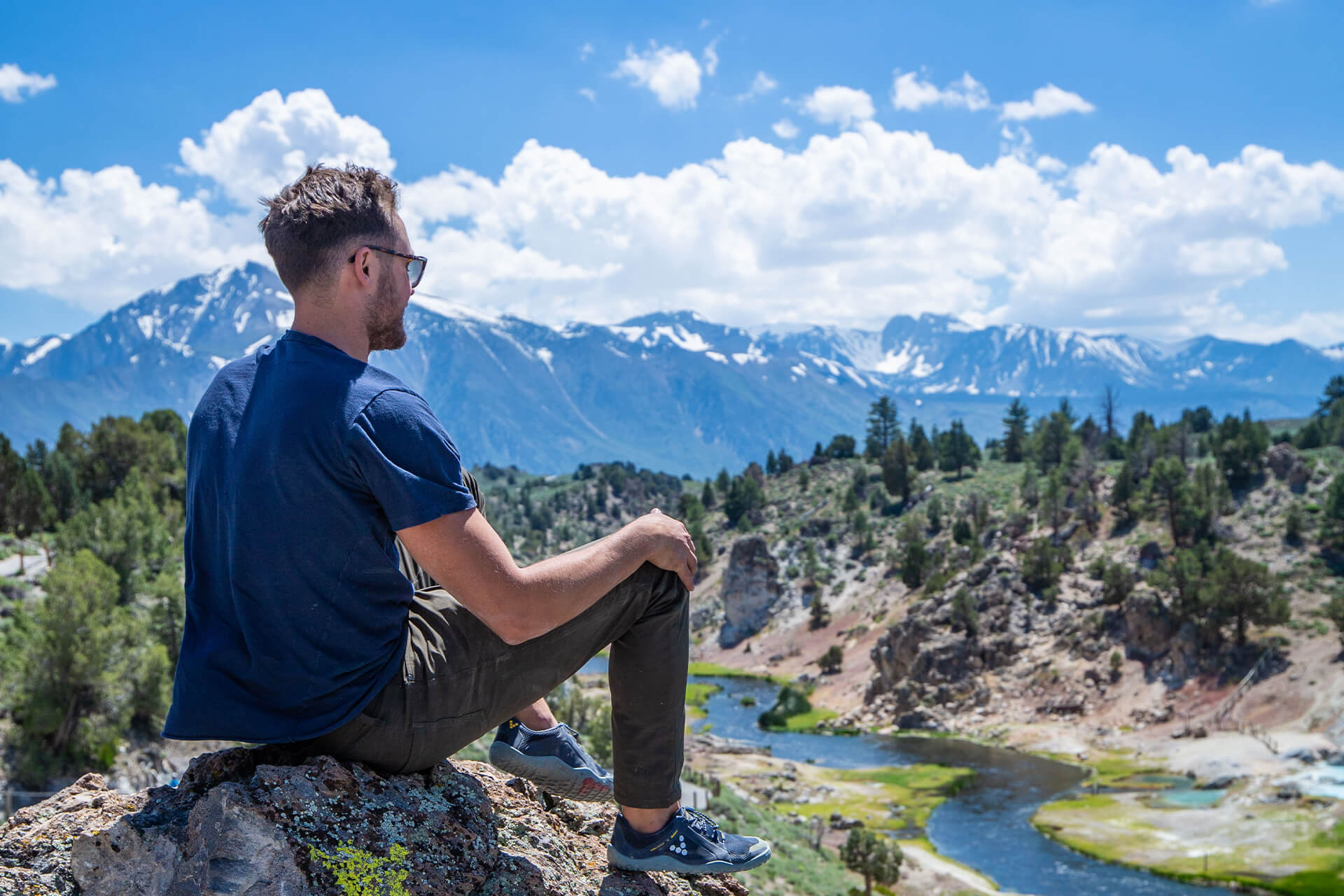 https://sierrameadowsranch.com/wp-content/uploads/2023/07/swinter-mammoth-lakes-person-on-mountain-peak-Dakota-Snyder.jpg