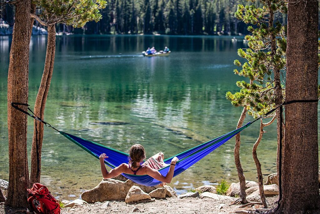 A woman in a hammock near Lake Mary lake.